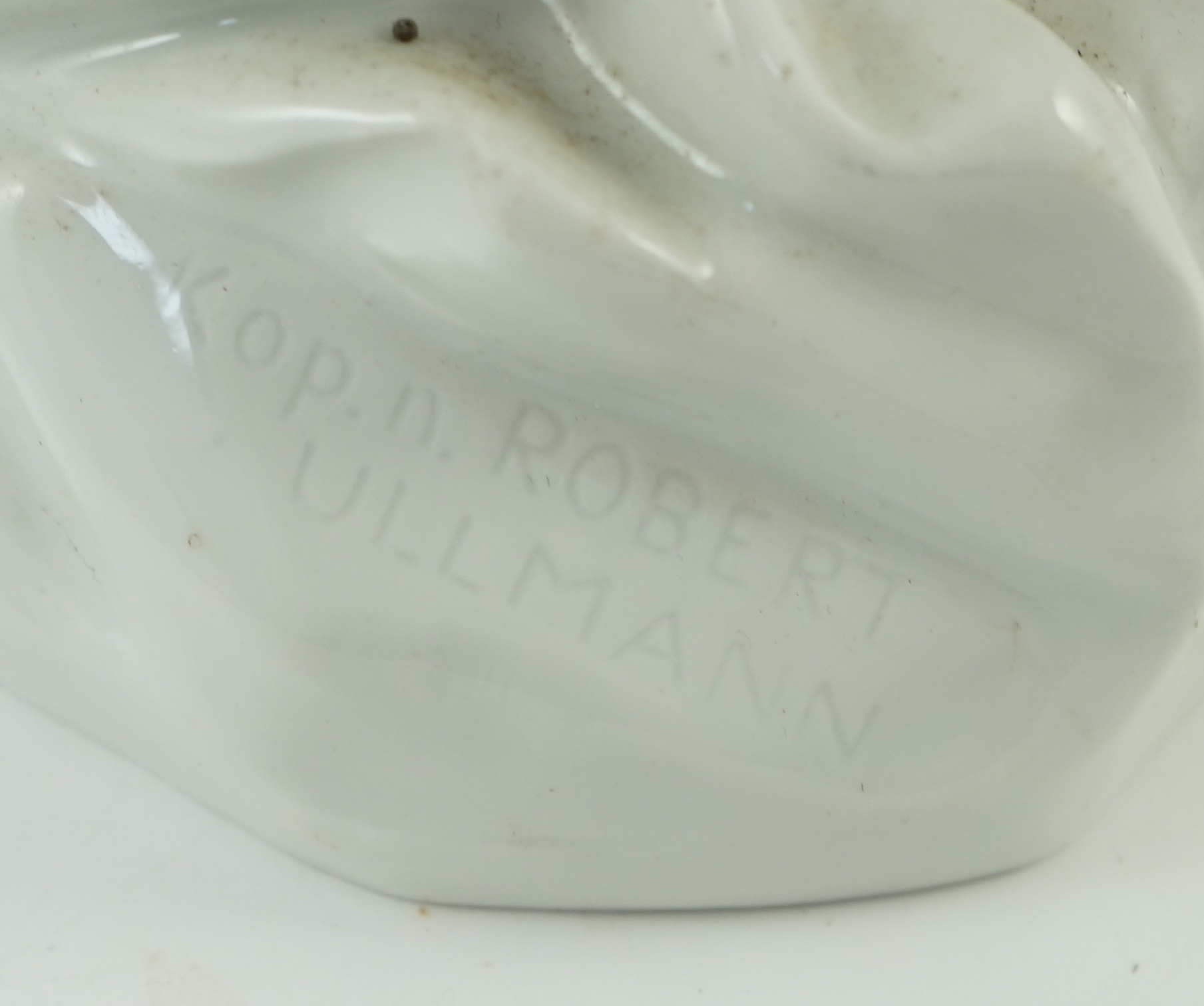 Robert Ullmann (1903-1966) for Meissen, a large white glazed porcelain three-quarter length figure of a nude woman, 50.5cm high